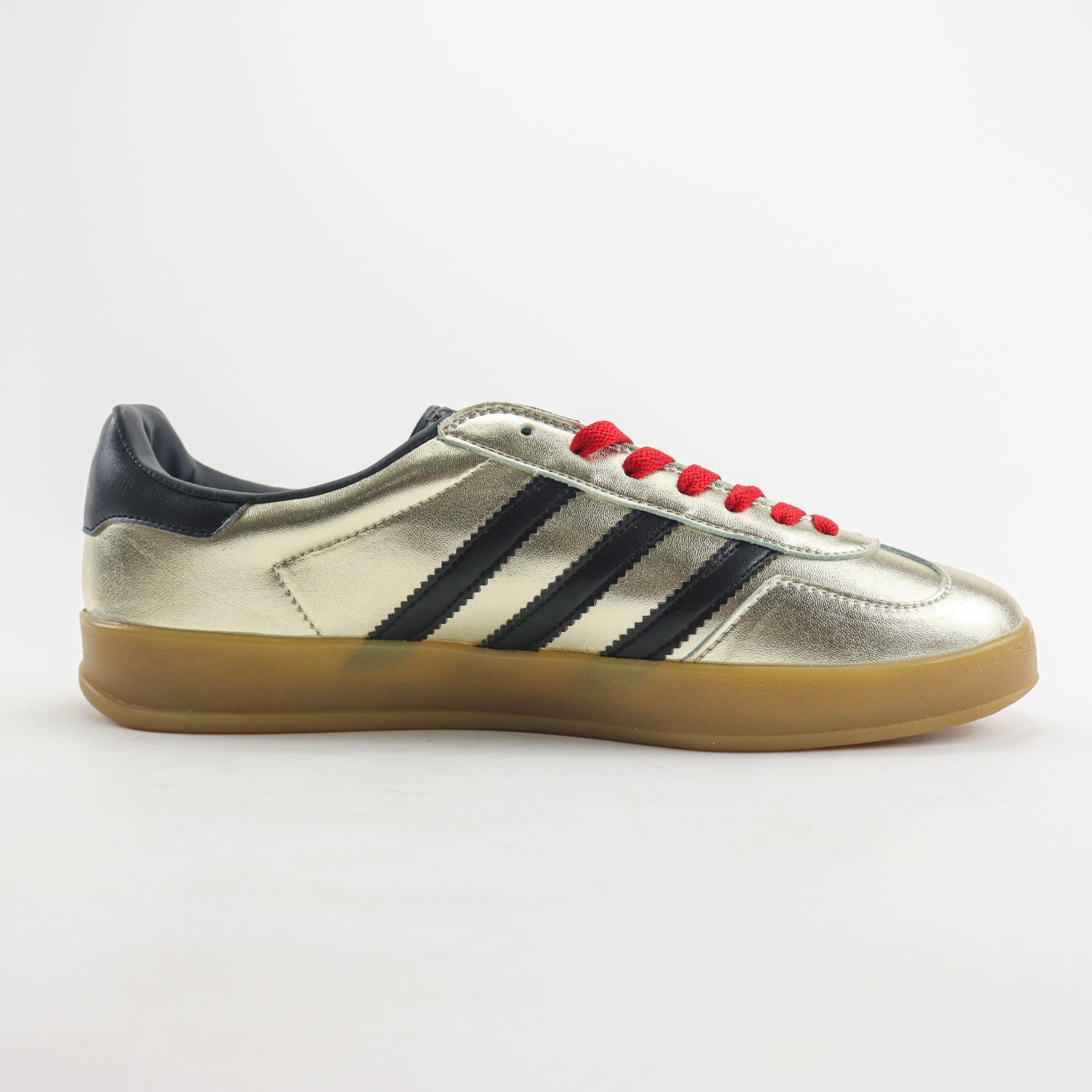 GG x Ads Gazelle Gold and Red Sneakers