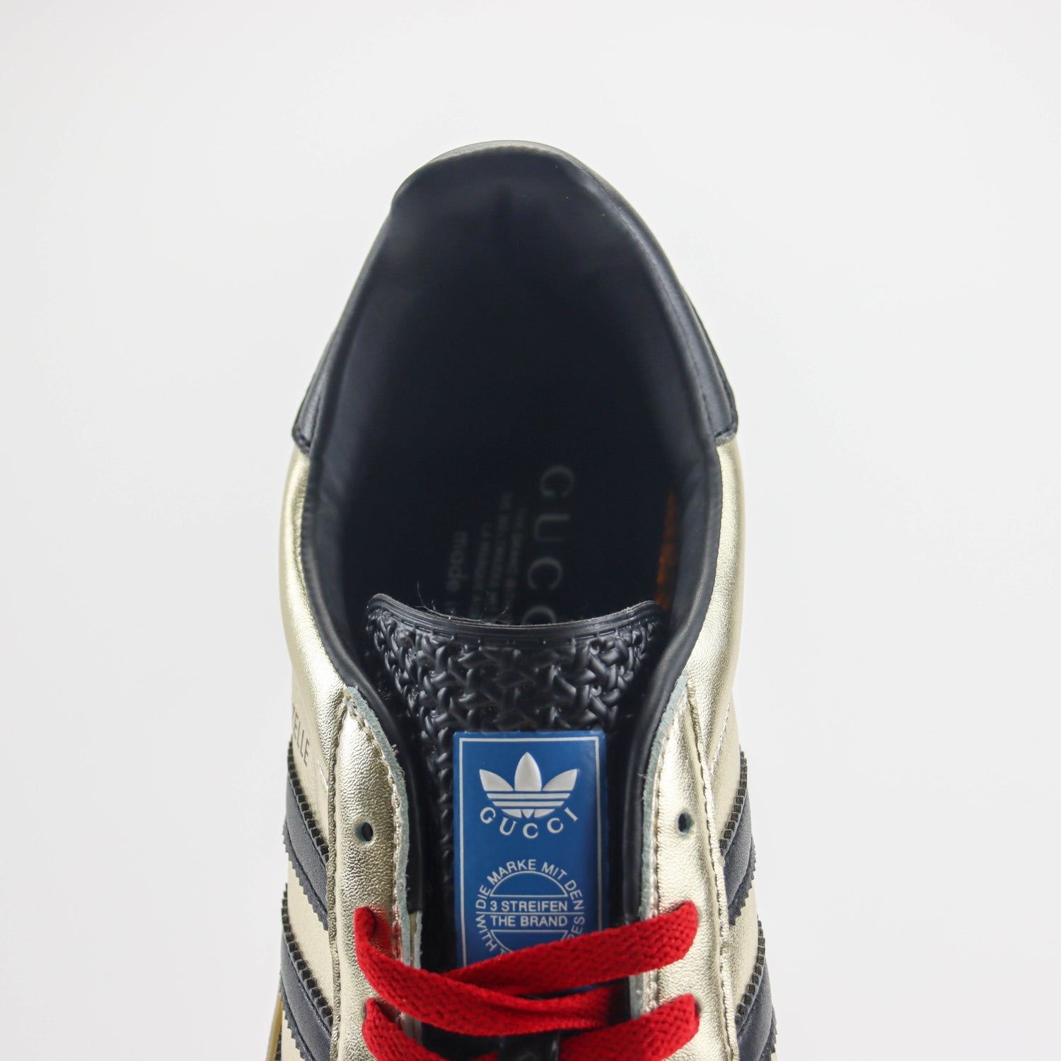 GG x Ads Gazelle Gold and Red Sneakers