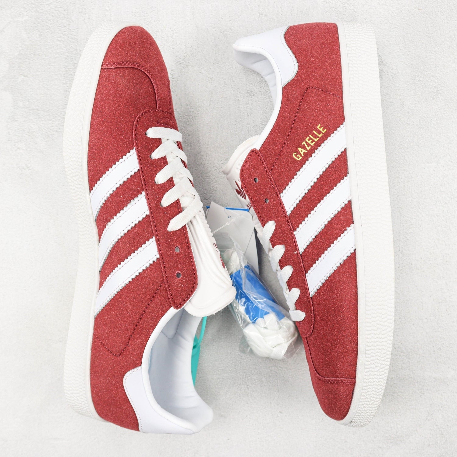 Red and White Gazelle Tennis Ads