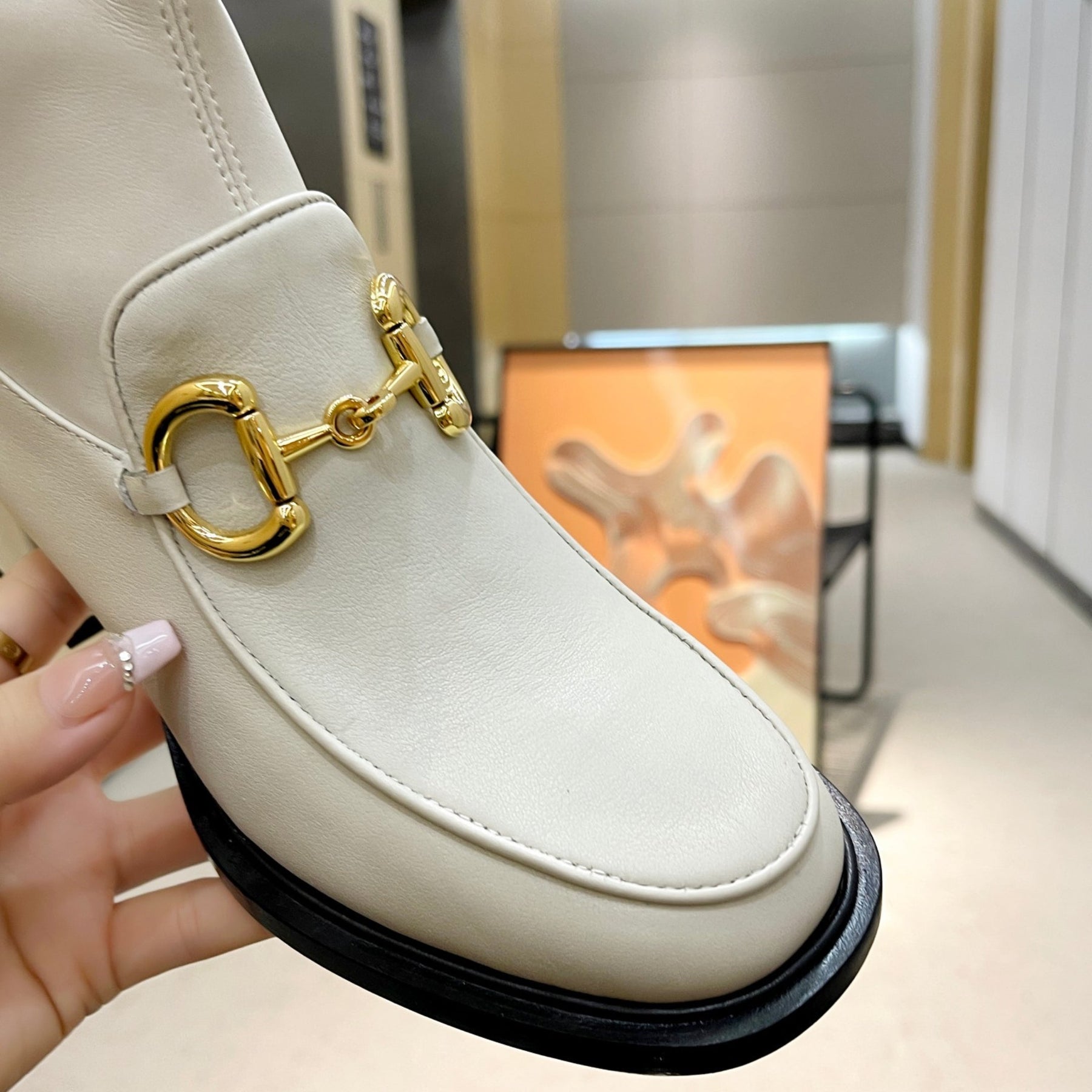 GG boot with horsebit detail and 55mm heel in white