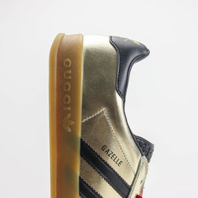 GG x Ads Gazelle Gold and Red Sneakers