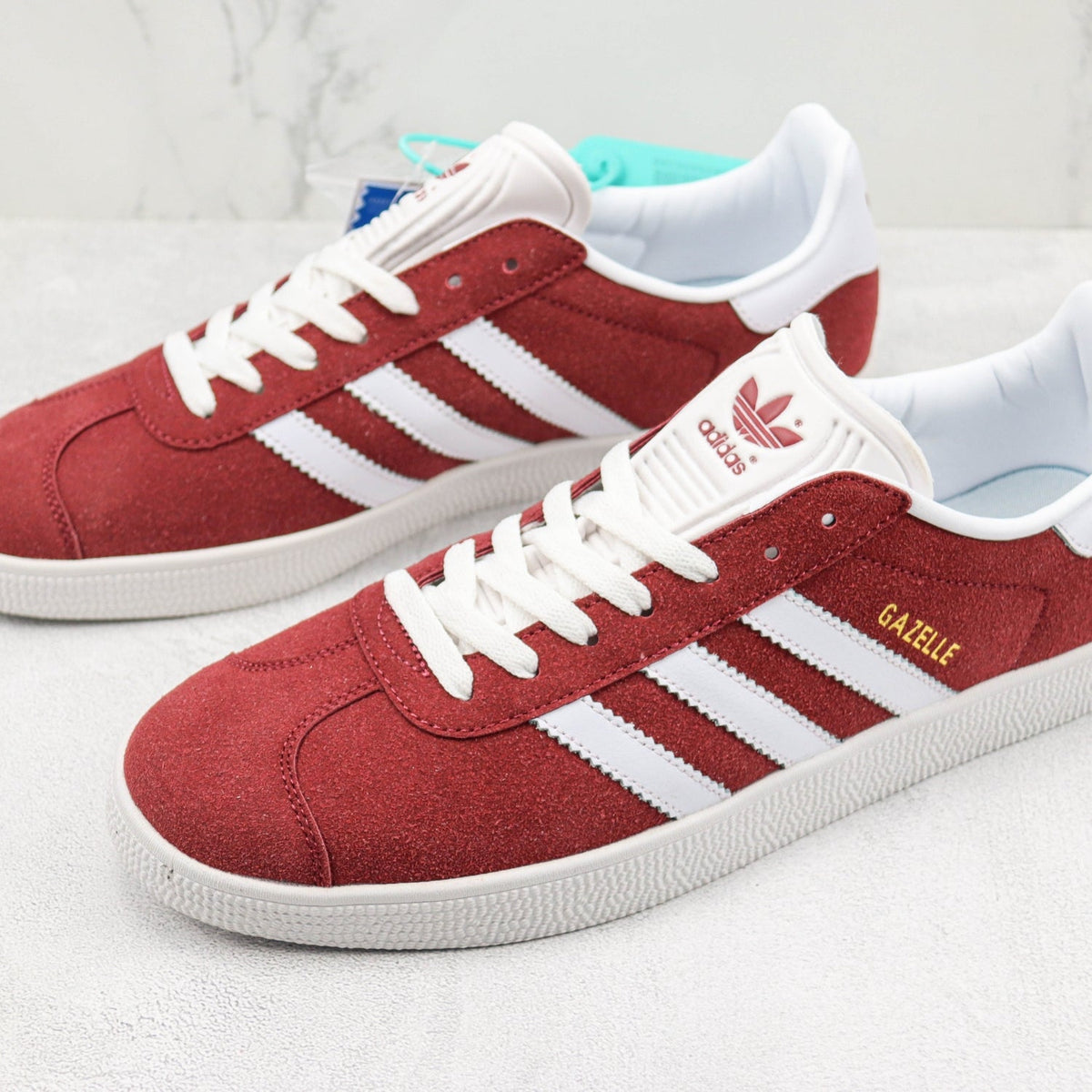 Red and White Gazelle Tennis Ads