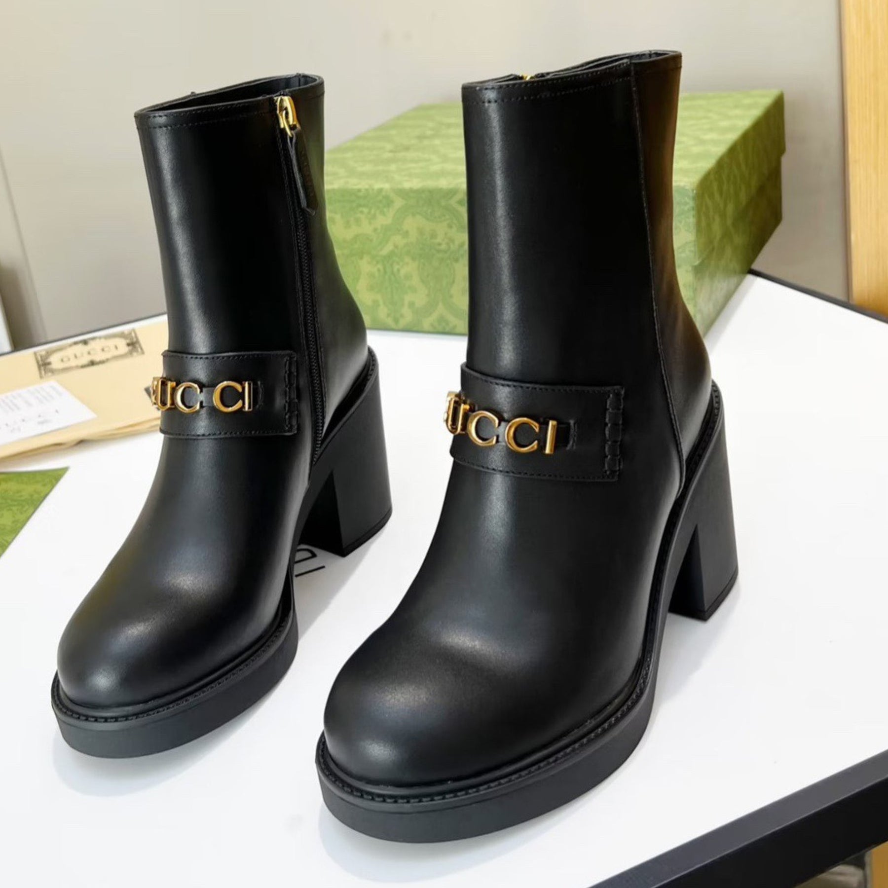 Black GG leather boot with logo