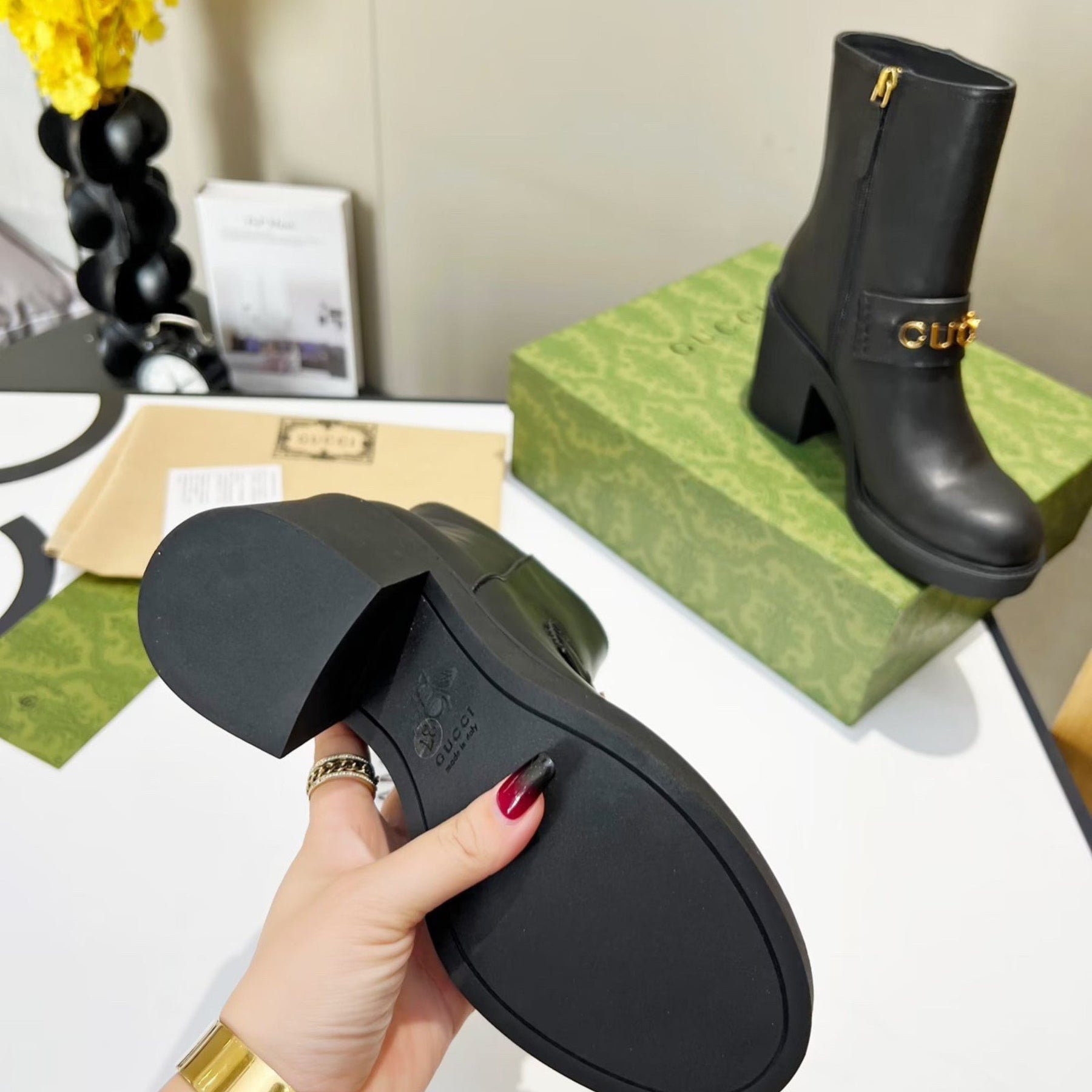 Black GG leather boot with logo