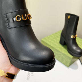 Black GG leather boot with logo