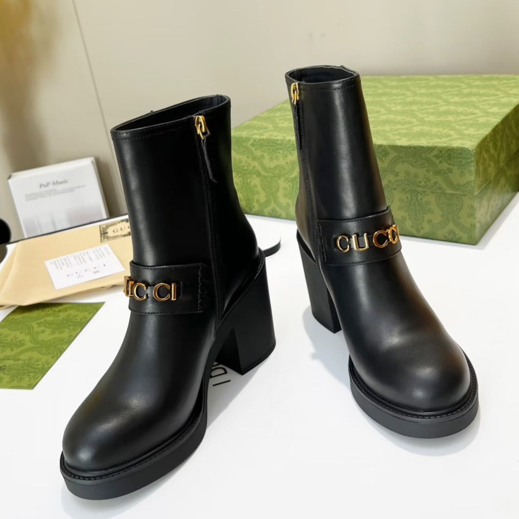 Black GG leather boot with logo