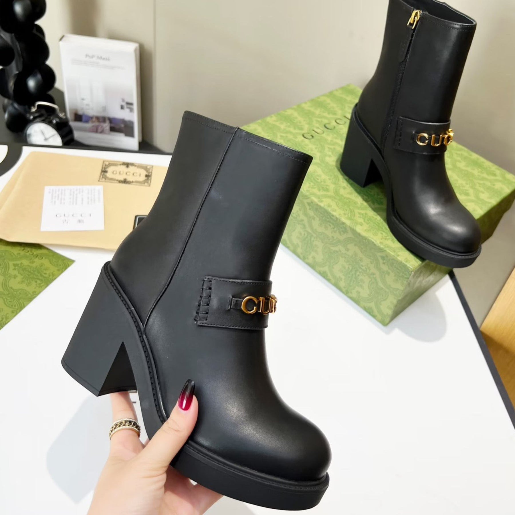 Black GG leather boot with logo
